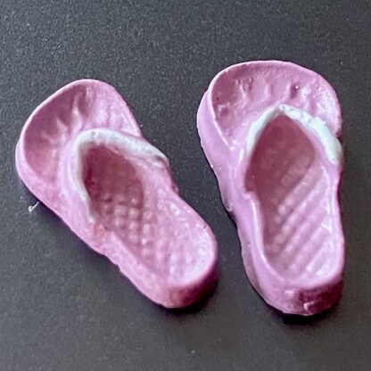 Winzige Flip-Flops (lila). Kunststoff.