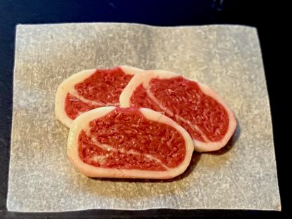 Steaks auf Papier. Handarbeit/England.