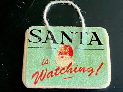 Schild "Santa is watching".