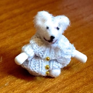 Miniatur-Teddy (hellblau). Handarbeit/Spanien.