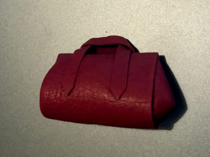 Handtasche (rot, Leder). Handarbeit aus England.