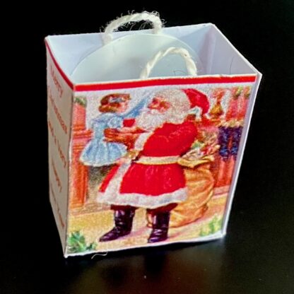 Geschenktasche (Nikolaus mit Kind). Papier.